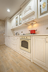 Image showing Luxury modern white and beige kitchen interior