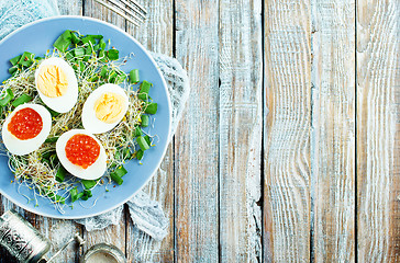 Image showing eggs with red salmon caviar