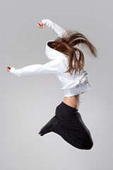 Image showing attractive jumping woman