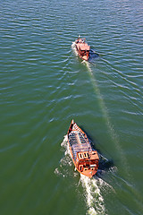 Image showing Tourist boat moving on The Duoro river in Porto 