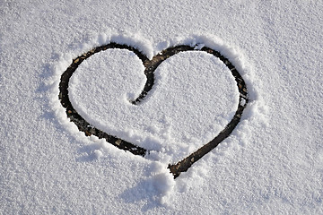 Image showing Heart drawn on white clear thin snow