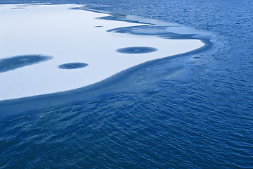 Image showing Frozen lake in early winter, phantom blue water color