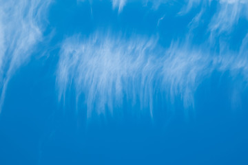 Image showing High white clouds in bright blue sky