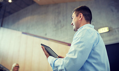 Image showing teacher with tablet pc at lecture hall