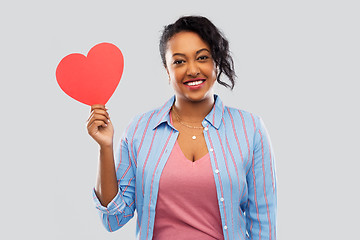 Image showing happy african american woman with red heart