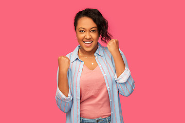 Image showing happy african american woman celebrating success