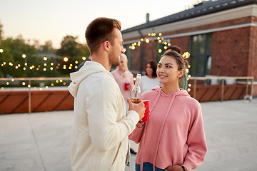 Image showing friends with non alcoholic drinks at rooftop party