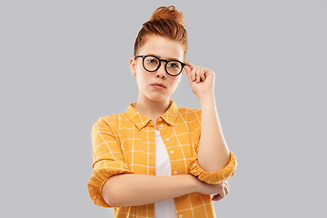 Image showing red haired teenage student girl in glasses