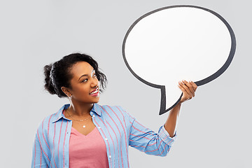 Image showing happy african american woman holding speech bubble