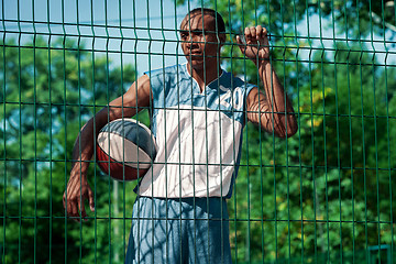 Image showing Picture of young resting african basketball player