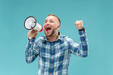 Image showing man making announcement with megaphone