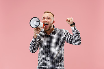 Image showing man making announcement with megaphone