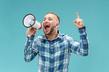 Image showing man making announcement with megaphone