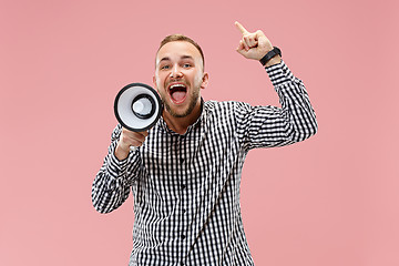 Image showing man making announcement with megaphone