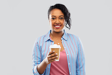 Image showing happy african american woman drinking coffee