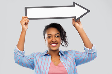 Image showing african american woman with rightwards arrow