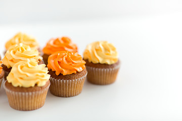 Image showing cupcakes with frosting on white background