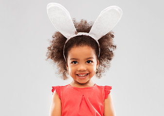 Image showing happy little girl wearing easter bunny ears