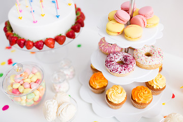 Image showing food and drinks on table at birthday party