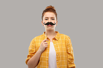 Image showing red haired teenage girl with black moustaches