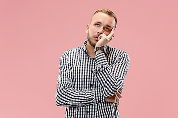 Image showing Beautiful bored man bored isolated on pink background