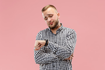 Image showing Beautiful bored man bored isolated on pink background