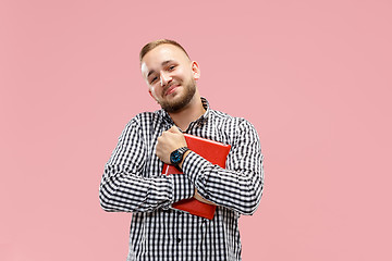 Image showing Businessman hugging laptop