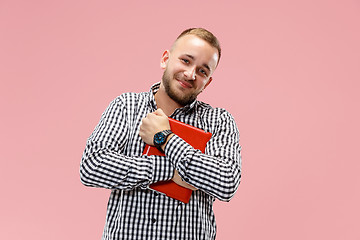 Image showing Businessman hugging laptop