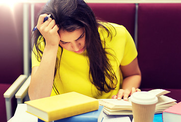 Image showing student girl with books and coffee on lecture