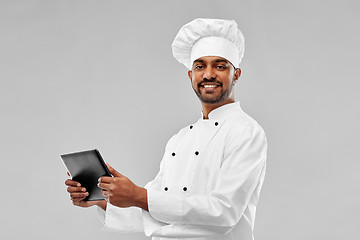 Image showing happy male indian chef with tablet computer