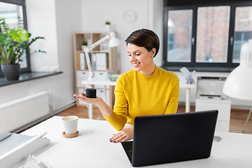 Image showing businesswoman using smart speaker at office