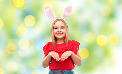 Image showing happy girl wearing easter bunny ears headband