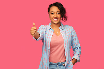 Image showing happy african american woman showing thumbs up