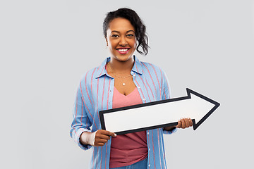 Image showing african american woman with rightwards arrow