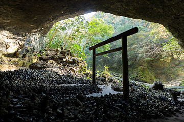 Image showing Shinto shrine torii in the cave