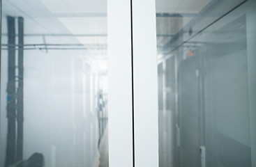 Image showing modern server room with white servers