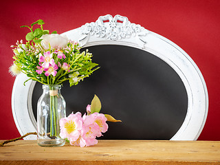 Image showing Spring decoration flowers and vintage frame