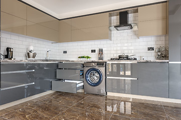 Image showing Luxury modern white, beige and grey kitchen interior