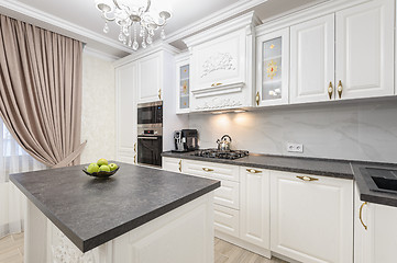 Image showing White luxury modern kitchen with island