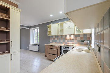 Image showing Luxury modern provence styled grey, pink and cream kitchen interior