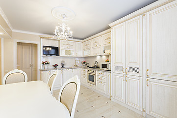 Image showing Luxury modern beige and cream colored kitchen interior