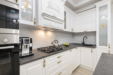 Image showing White luxury modern kitchen with island