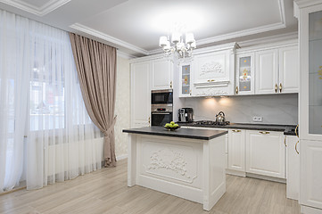 Image showing White luxury modern kitchen with island