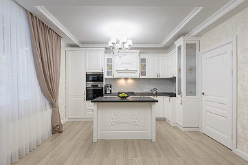 Image showing White luxury modern kitchen with island