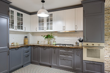 Image showing modern grey and white wooden kitchen interior