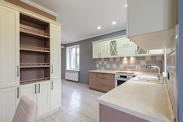 Image showing Luxury modern provence styled grey, pink and cream kitchen interior