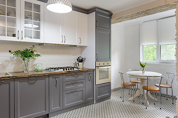 Image showing modern grey and white wooden kitchen interior