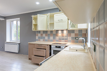 Image showing Luxury modern provence styled grey, pink and cream kitchen interior