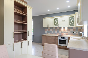 Image showing Luxury modern provence styled grey, pink and cream kitchen interior