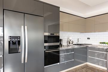 Image showing Luxury modern white, beige and grey kitchen interior